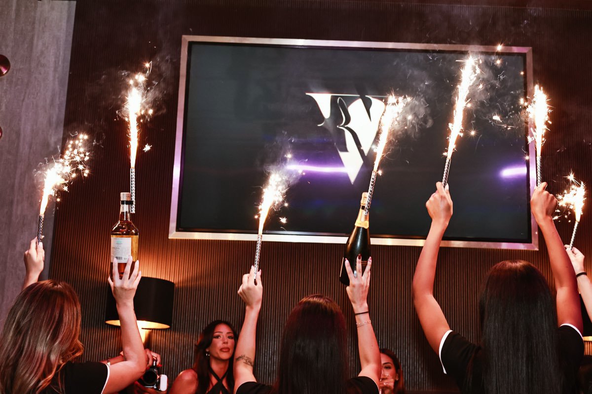 Bottles carried out under sparklers to the Victory & Vice mark on the big screen.